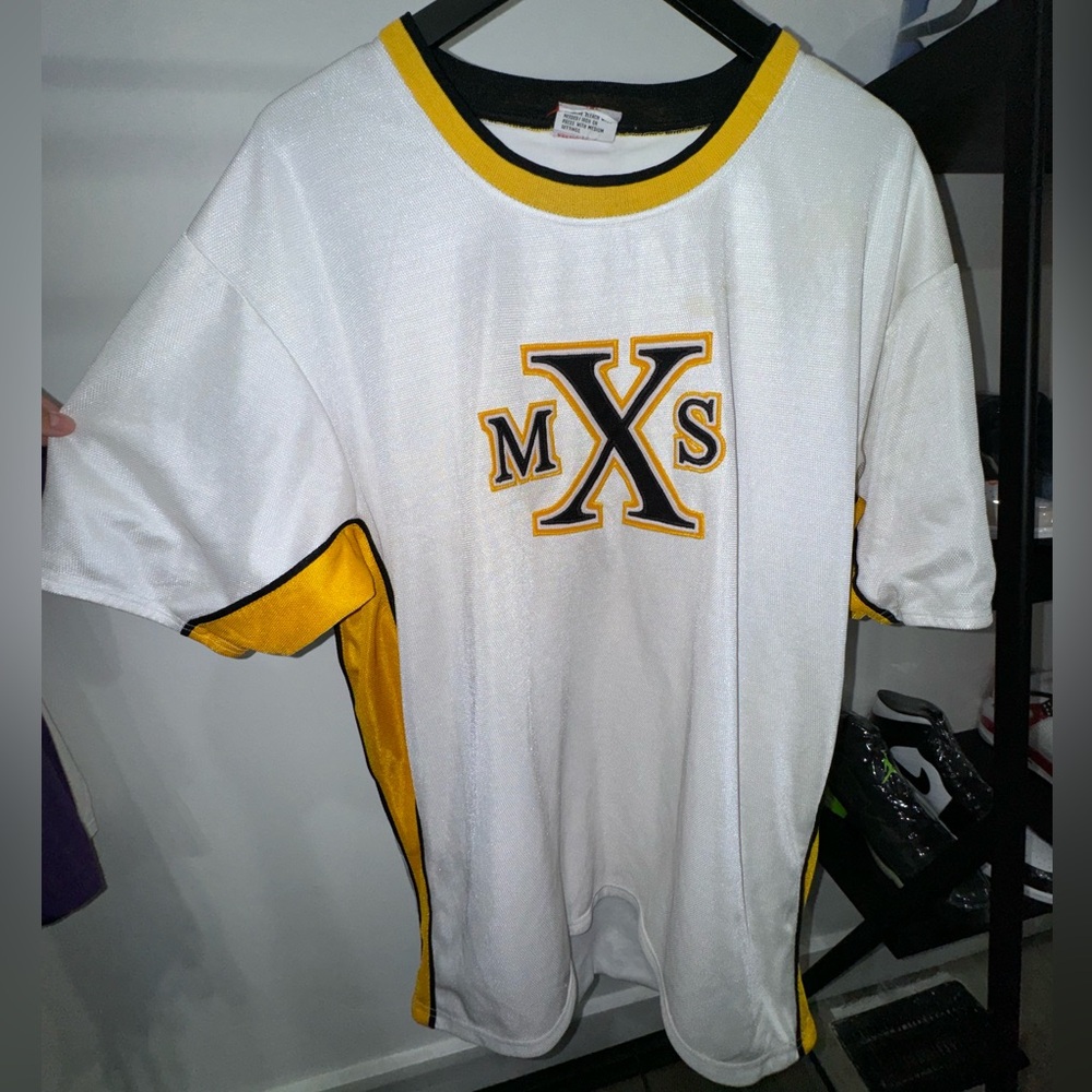White and yellow MSU Spartans shirt